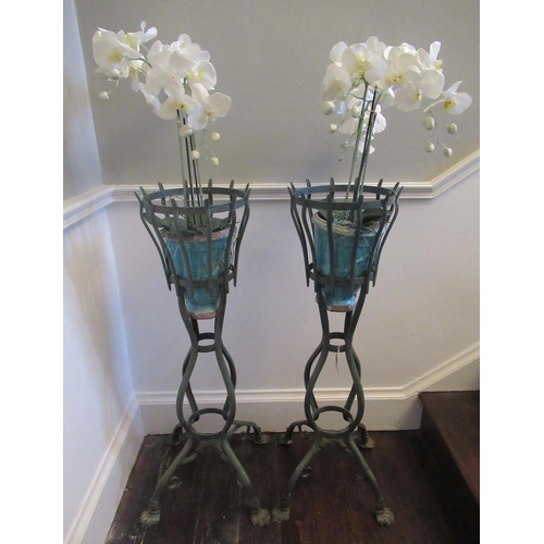 2009 - Pair of C20th  French wrought metal openwork jardinière, on four outsplayed supports with paw feet m... 