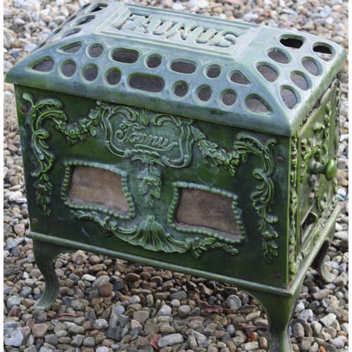 3209 - Faunus cast iron stove with ornate floral and swag design