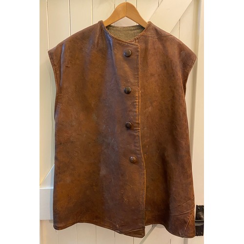 2084 - C20th tan leather jerkin, with four buttons, and blanket lining