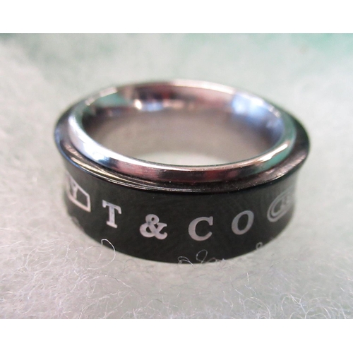 102 - Tiffany & Co black titanium on sterling silver ring 2005 in original box, UK size J/K