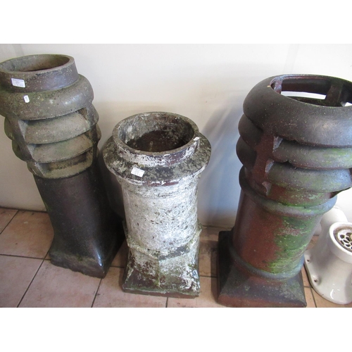50 - Two chimney pots in louvred form with another smaller chimney pot, tallest H95cm