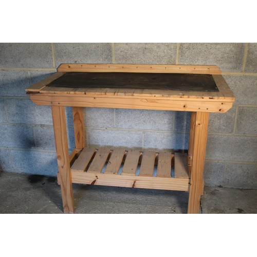 3336 - Wooden work bench with ruled measurement back, H94cm W117cm