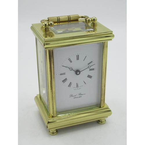 13 - Swiss, retailed by David Peterson, England, C20th brass cased carriage clock timepiece with visible ... 