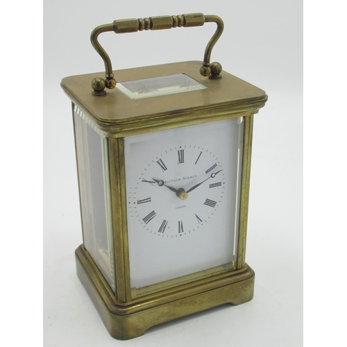 16 - Swiss, retailed by Matthew Norman, London, C20th brass cased carriage clock timepiece with visible p... 