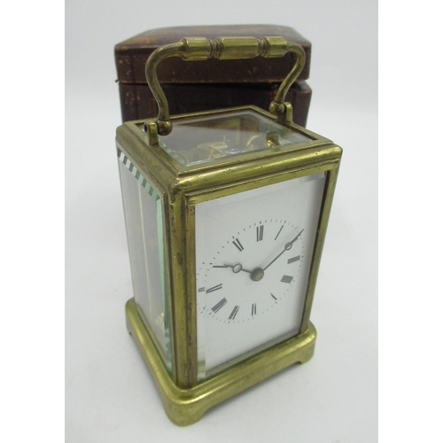 2 - Early C20th brass cased carriage clock timepiece with visible platform lever escapement, with associ... 