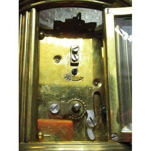 34 - Matthew Norman, London, two similar brass cased carriage clock timepieces of small proportions, both... 