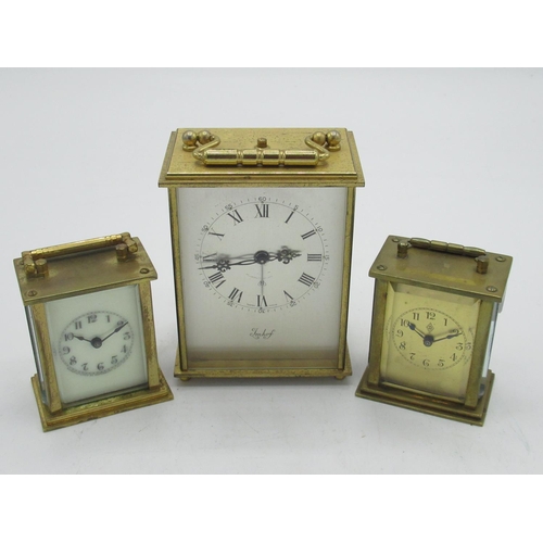 38 - Imhorf Swiss brass cased carriage clock type travel alarm, two miniature brass cased carriage clock ... 