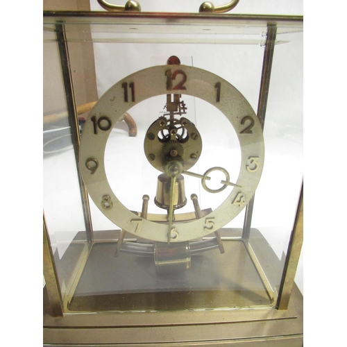 44 - Three Kundo electronic lacquered brass cased mantel clocks