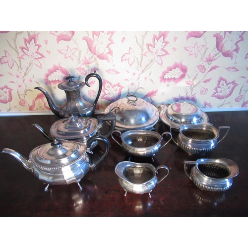 2033 - Geo.III style EPNS three-piece tea service, another with gadrooned borders, an entree dish and a ser... 