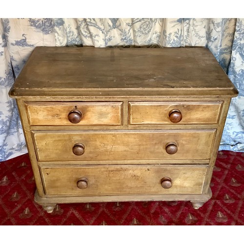 2067 - Victorian waxed pine chest with moulded top above two short and two long graduated drawers, turned w... 