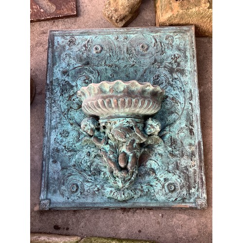 3208 - Ornate verdigris copper wall font with floral design, supported by winged cherubs, H79cm W94cm