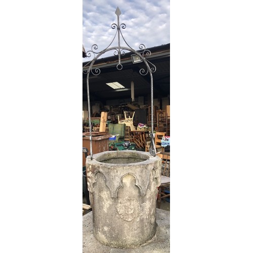 3220 - Stone wishing well with Gothic rose and lion shield design W77cm H74cm, on large octagonal base appr... 