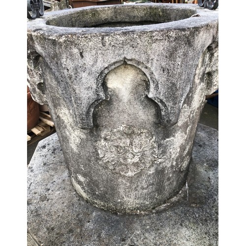 3220 - Stone wishing well with Gothic rose and lion shield design W77cm H74cm, on large octagonal base appr... 