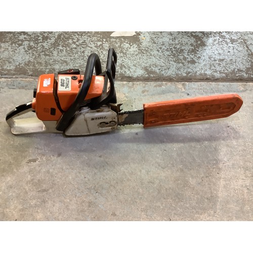 3214 - Stihl 036 petrol chainsaw with 18 inch bar and safety helmet