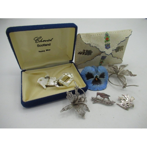 21 - Large white metal brooch in the form of a filigree daffodil W5.5cm and another smaller both stamped ... 