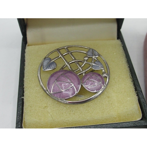 38 - Charles Renne Mackintosh style circular brooch with silver and enamel rose design D4cm, matching nec... 