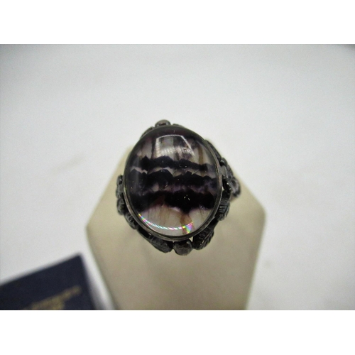 19 - Blue John ring with oval central set Blue John with rub over setting, shank stamped Silver, size S i... 