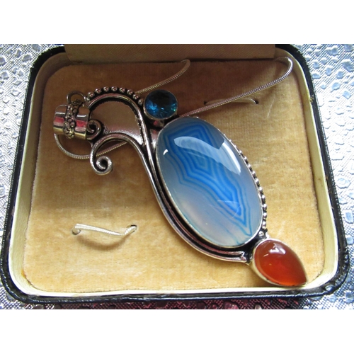 43 - Collection of six Sterling silver brooches and two necklaces each with agate and hard stone inset in... 