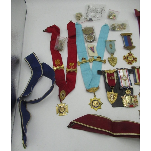 63 - Large collection of Royal Antediluvian Order of Buffaloes medals and pins, including star shaped ser... 