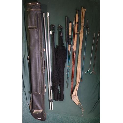 156 - Fishing bag containing split cane, two fiber glass starter rods, two large carp landing nets in leat... 