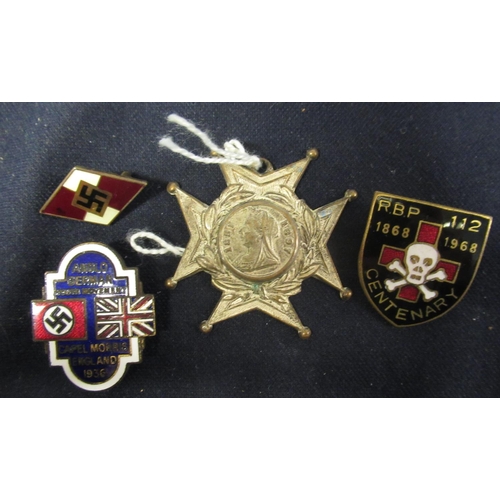 301 - Collection of ten pieces of military insignia including Royal Navy, Torpedo Training Anchor, WWI Geo... 