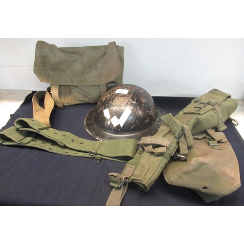 304 - Collection of WWII military uniform including black Brody helmet with full lining and strap, boxed c... 