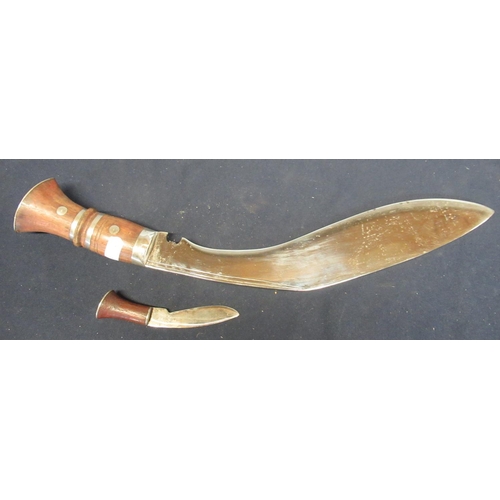 313 - Wooden handled kukri in leather and wood sheath with single skinning knife (A/F) (2)