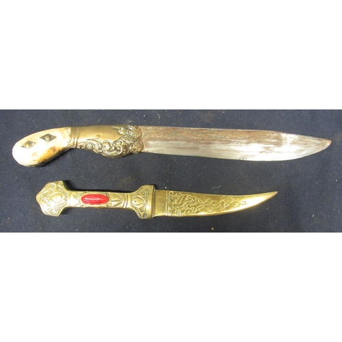 316 - Bedouin knife in wooden sheath with brass fittings, decorated brass handle and bone pommel, with ful... 