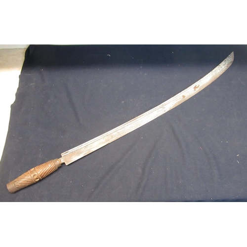 317 - Large tribal sword with wooden carved handle (missing handguard) and full tang, blade L26