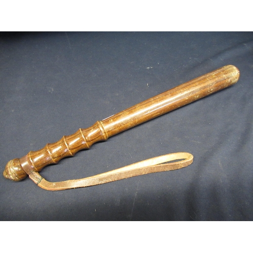 106 - Early/mid C20th turned wood police truncheon with leather lanyard