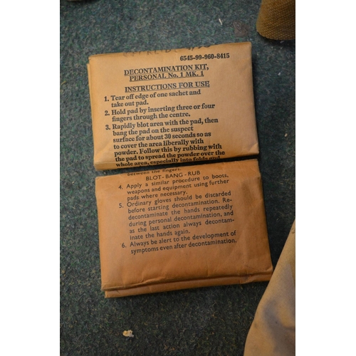 291 - Two boxed WWII gas masks, WWII gas mask bag with contents stamped H & Sons 1941 with crowsfoot arrow... 