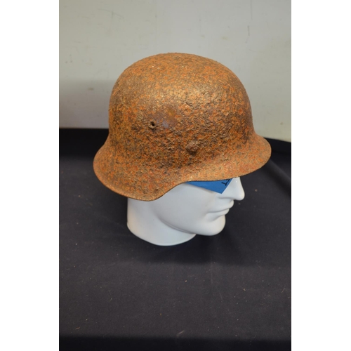 292 - German WWII relic state steel helmet (believed to have been dug up in Estonia)