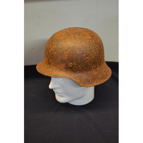 292 - German WWII relic state steel helmet (believed to have been dug up in Estonia)