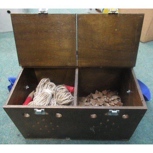 54 - Bow backed double compartment ferret box, with collection of nine nets