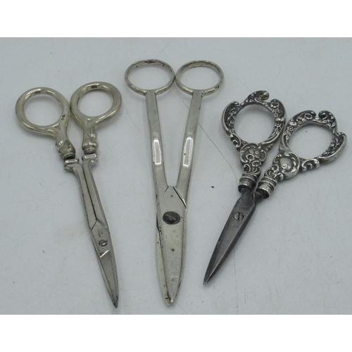 161 - Edw.VII hallmarked Sterling silver repoussé decorated scissors with steel blades by Levi & Salaman, ... 