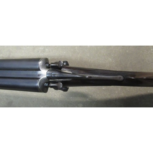 395 - Wallas 12B side by side hammer shotgun with double trigger action, barrels L30