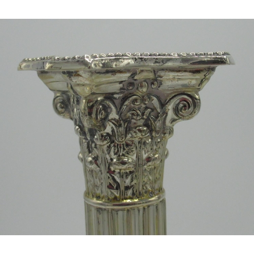 6 - Pair of Victorian hallmarked Sterling silver Corinthian column candlesticks on stepped square bases ... 