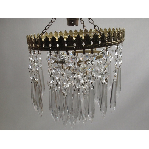 258 - Gilt metal coronet type light fitting, with two graduated tears hung with prismatic drops, ceiling  ... 