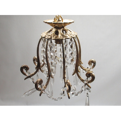 258 - Gilt metal coronet type light fitting, with two graduated tears hung with prismatic drops, ceiling  ... 