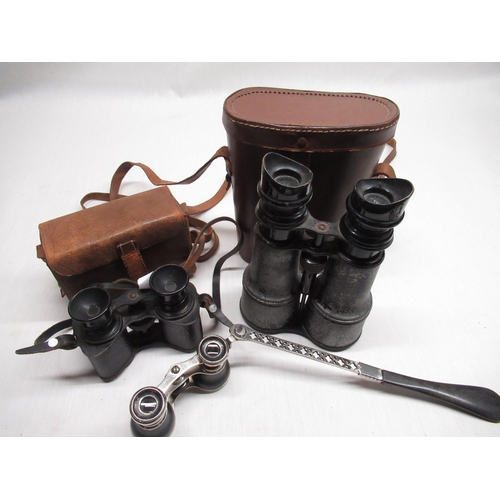 267 - C20th French binoculars retailed by Army and Navy stores in brown leather case, pair of Radium Prism... 