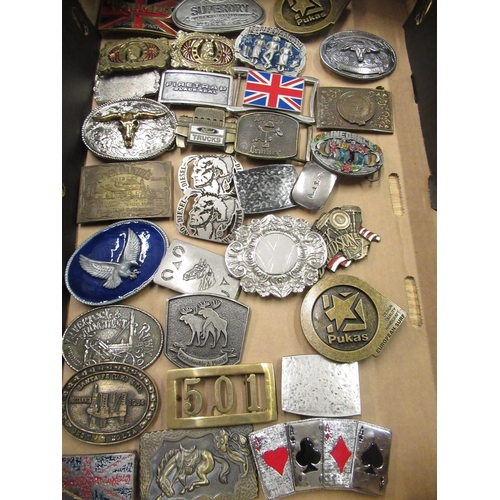 269 - Collection of brass and other coloured enamel decorated belt buckles, including Triumph, Paul Smith,... 