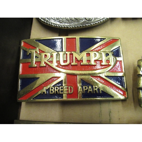 269 - Collection of brass and other coloured enamel decorated belt buckles, including Triumph, Paul Smith,... 