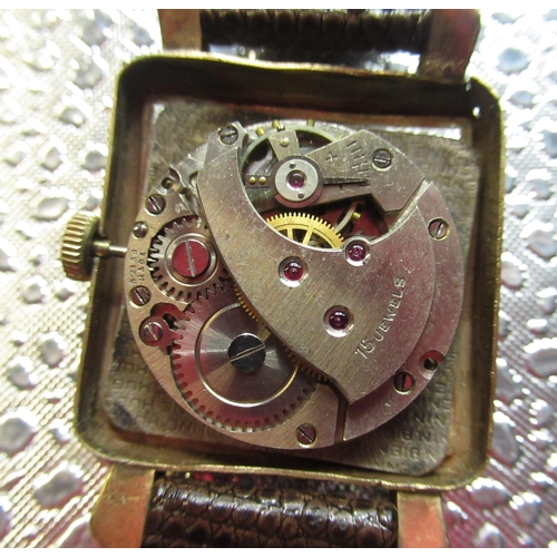 205 - 1950's Avia 9ct gold cased hand wound wristwatch, square gold case with snap on back stamped .375 an... 