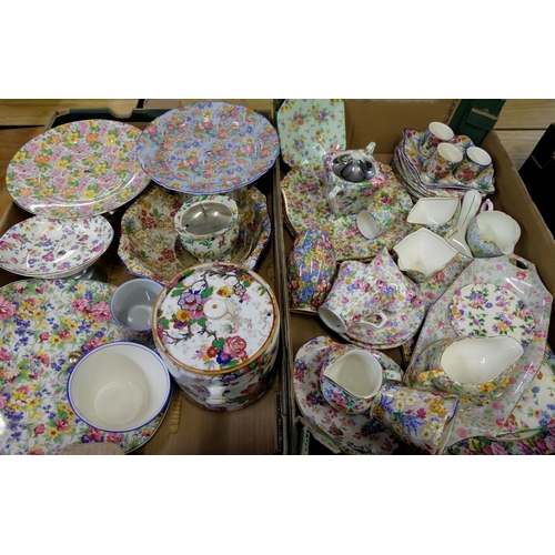 100 - Large collection of chintz ceramics including egg cups, plates, cups and saucers, biscuit barrels, c... 