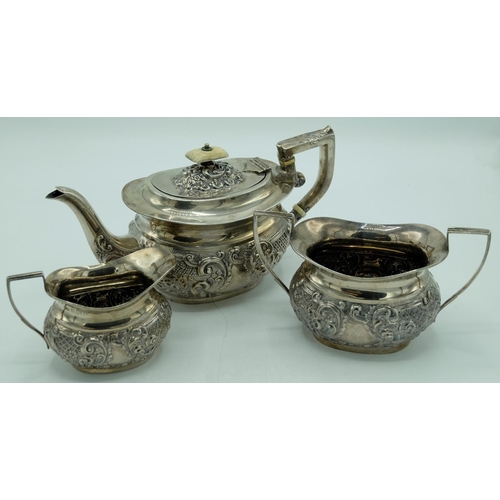 1154 - Edw.VII hallmarked silver three-piece Batchelors tea service, ovoid bodies repoussé with scrolls, by... 