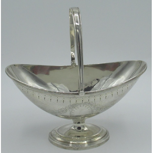 1158 - Victorian hallmarked Sterling silver navette bonbon dish with swing handle on circular pedestal base... 