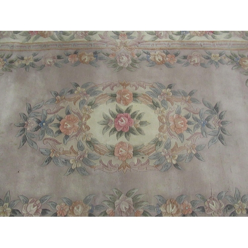 348 - C20th Chinese embossed washed woolen rug, beige ground with central rose motifs surrounded by floral... 