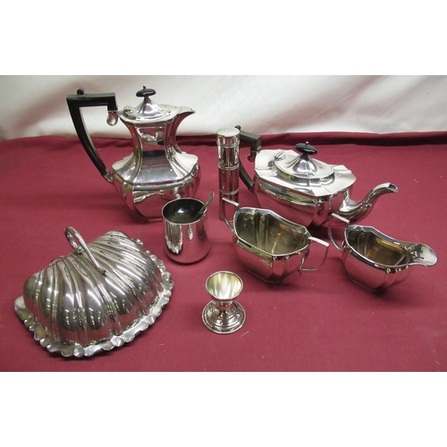 73 - Early C20th EPNS four piece tea service with ebonised handles and finials, an EPNS shell shaped dish... 