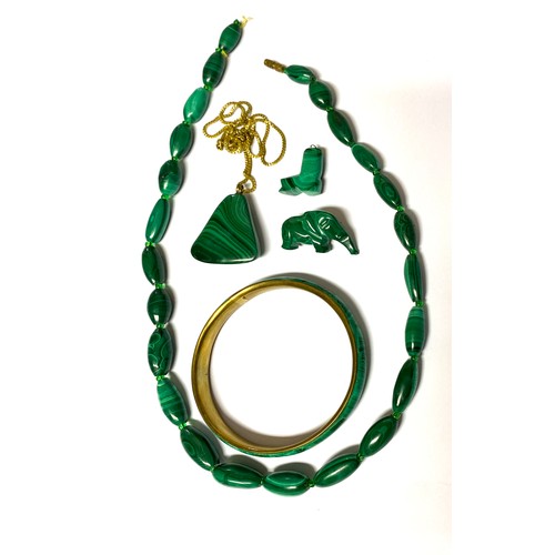 75 - Collection of malachite jewellery including elephant and boot brooch, bead necklace (AF), triangular... 