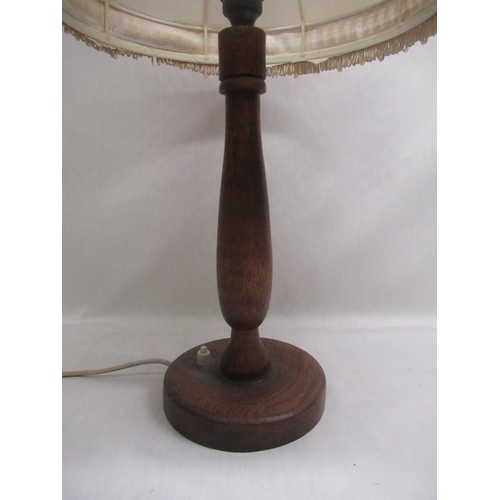 399 - Oak baluster lamp with shade